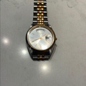 Wittnauer watch 1980 two toned stainless and gold. Mens watch